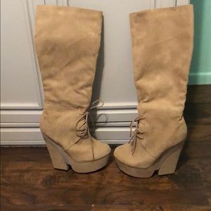 Knee high heeled boots